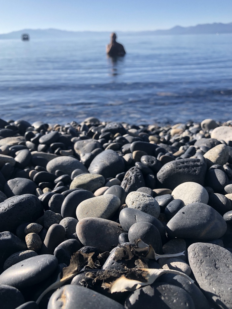 Man emerges from lake water